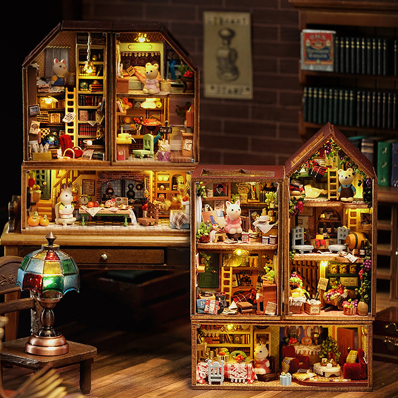 Miniature dollhouse model showing furnished interior rooms
