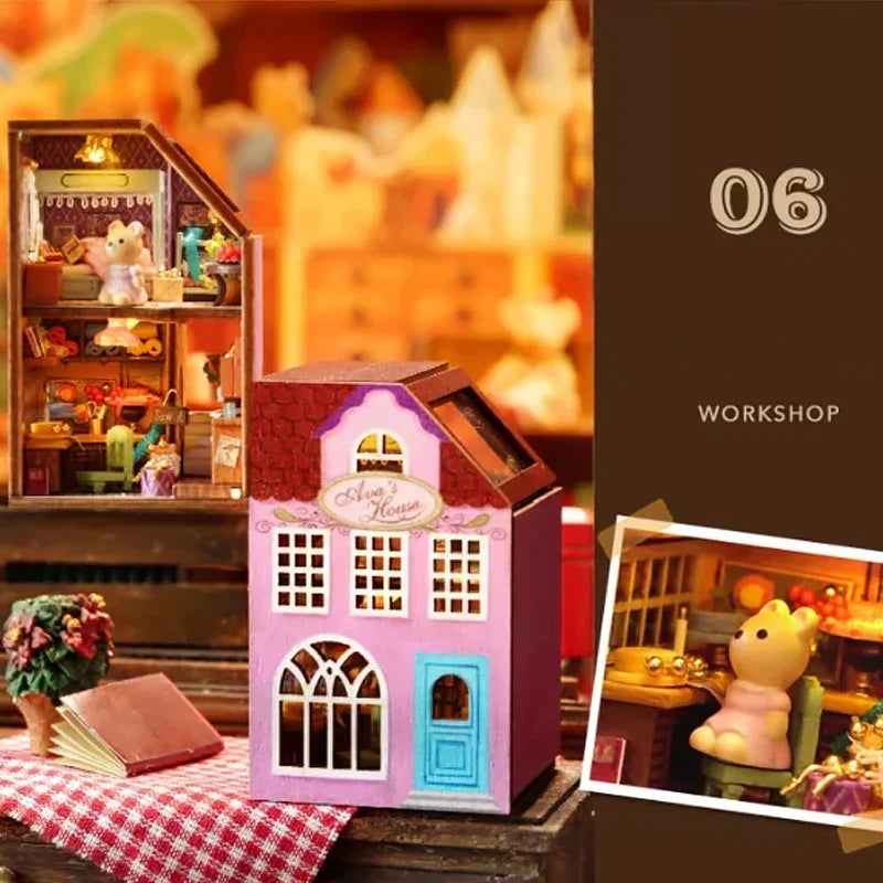 Pink house miniature workshop display with book