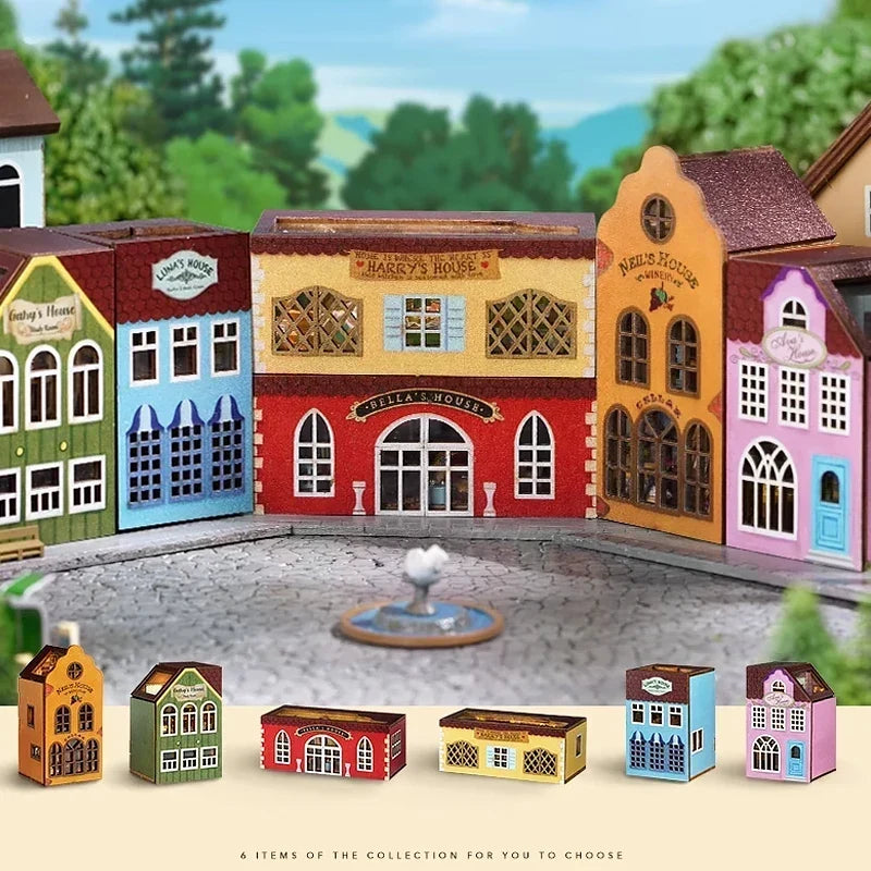 All six miniature house models grouped together with fountain