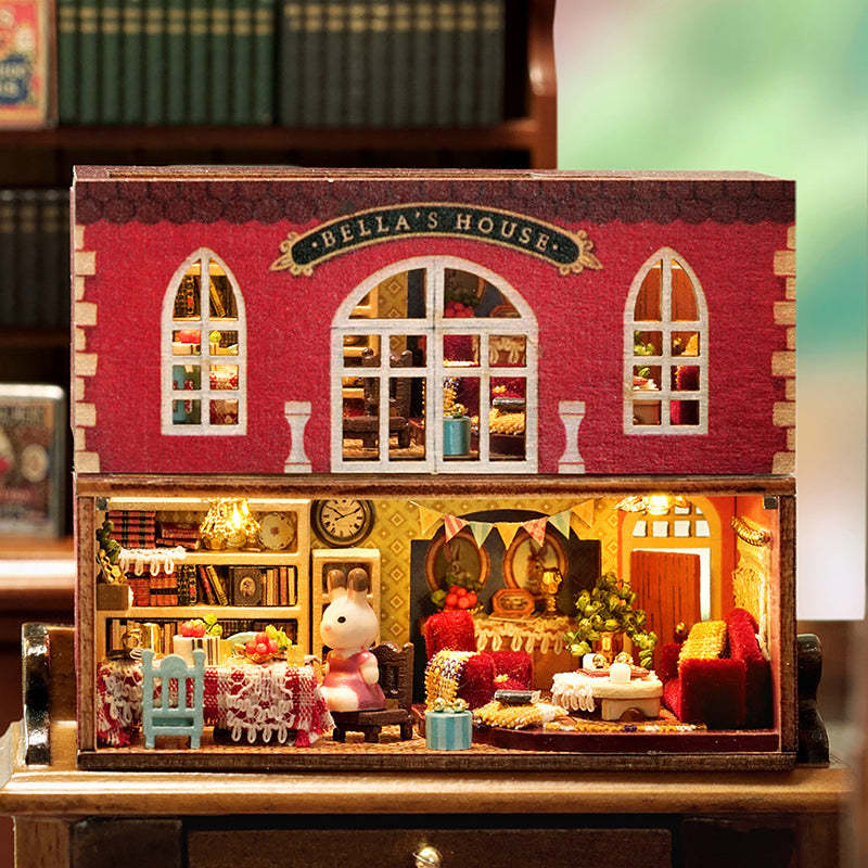 Miniature boutique storefront dollhouse model in warm light