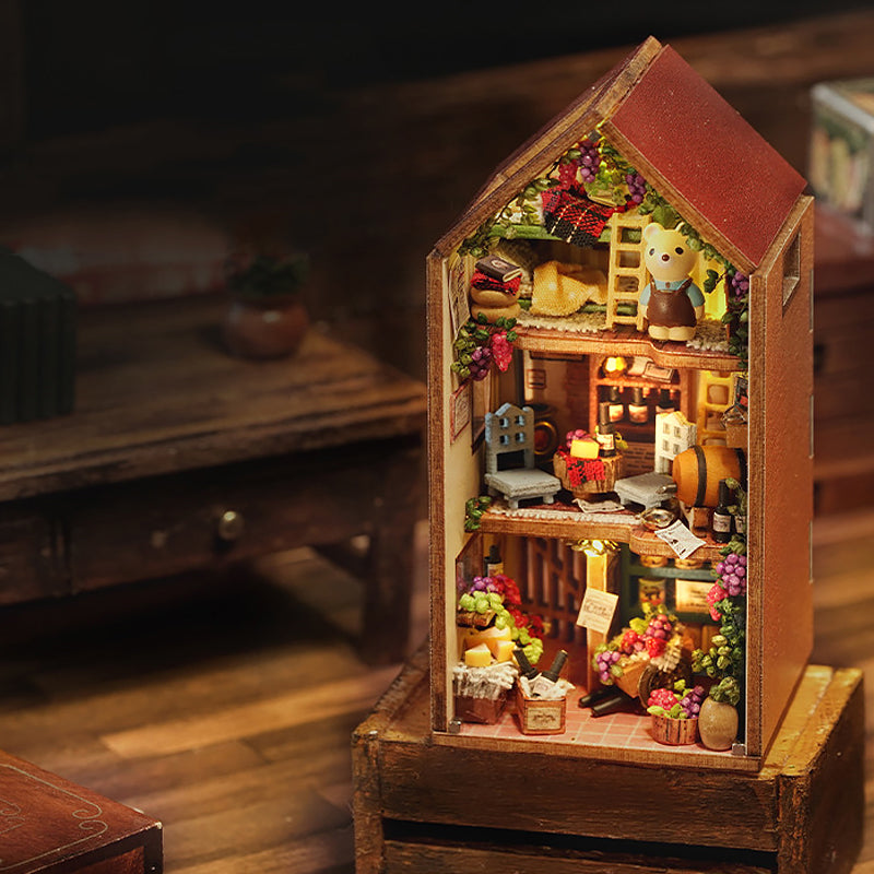 Tall narrow miniature dollhouse model in warm light