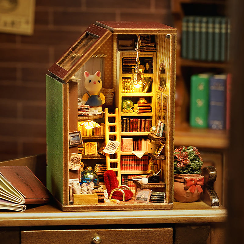 Tall treehouse-style miniature dollhouse model in warm light